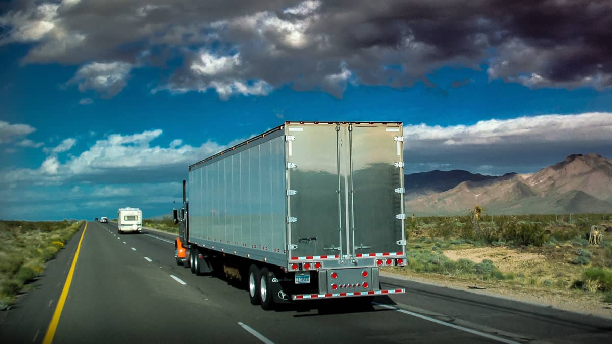 A MOVIN WEIGHT LLC tractor and dry van on the Multi-State lanes